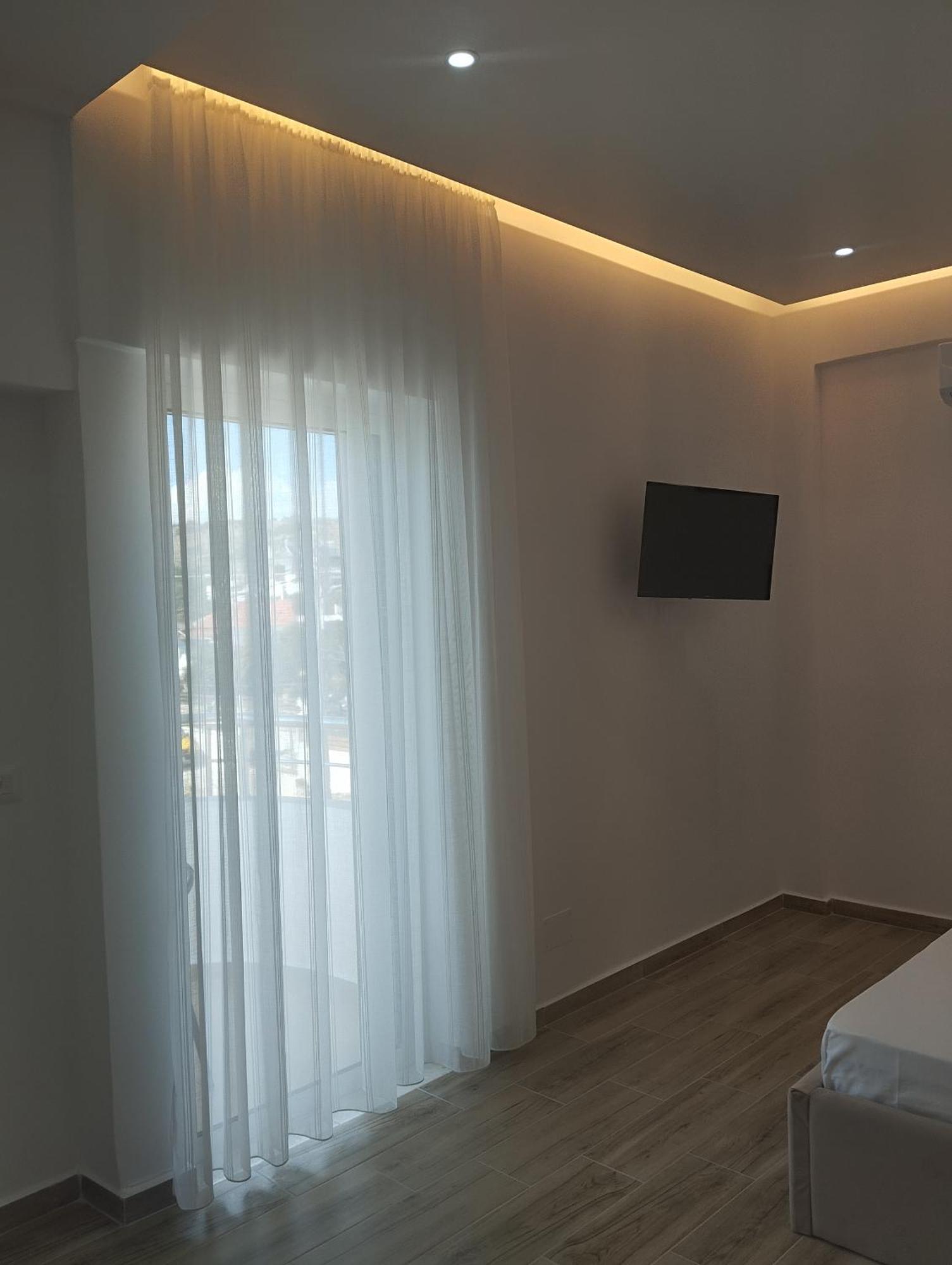 Amente Apartaments Ксамил Стая снимка